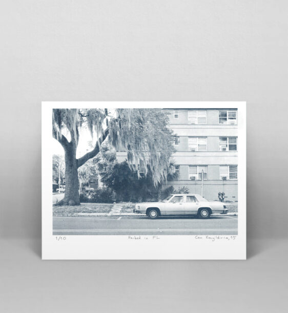 A risograph print of a photo of a car parked in St. Petersburg, Florida.