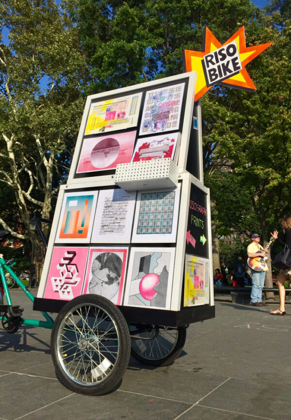 Riso Bike at Washington Square Park on a bright sunny day, NYC art vendor